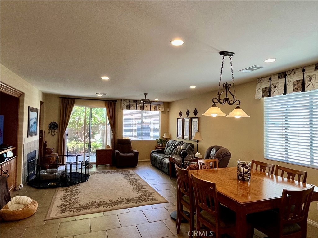 1244 Katherine Court Beaumont, CA 92223 - Photo 7 of 19 a view of a dining room with furniture window and outside view