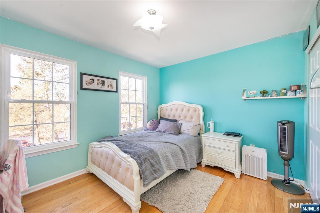10 Gannet Court Wayne, NJ 07470 - Photo 19 of 24 a bedroom with a bed and a window
