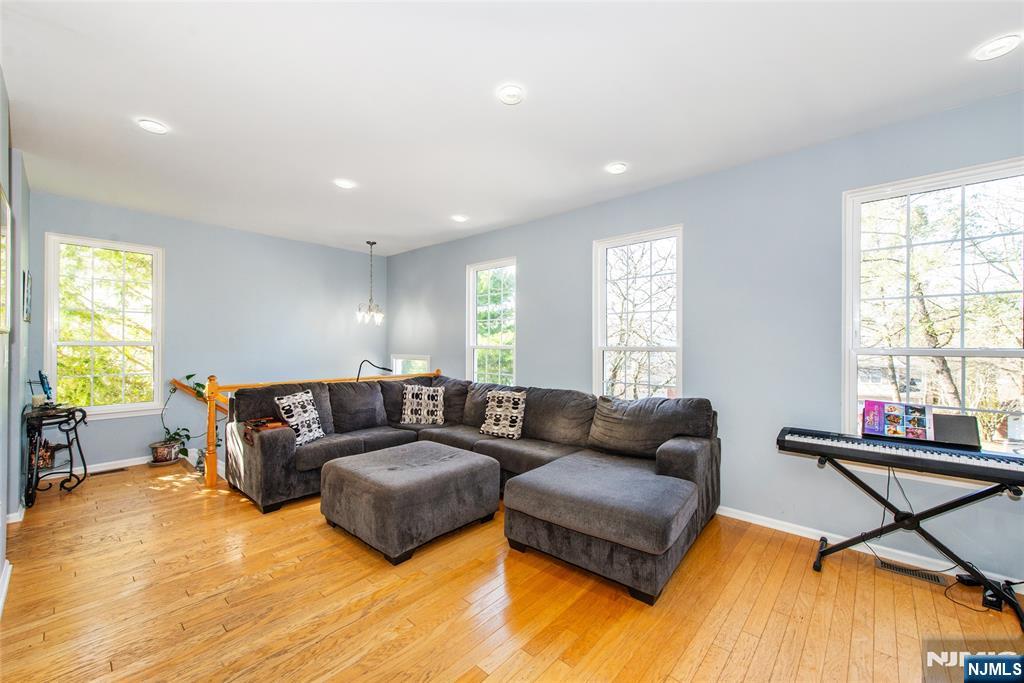 10 Gannet Court Wayne, NJ 07470 - Photo 7 of 24 a living room with furniture and a window