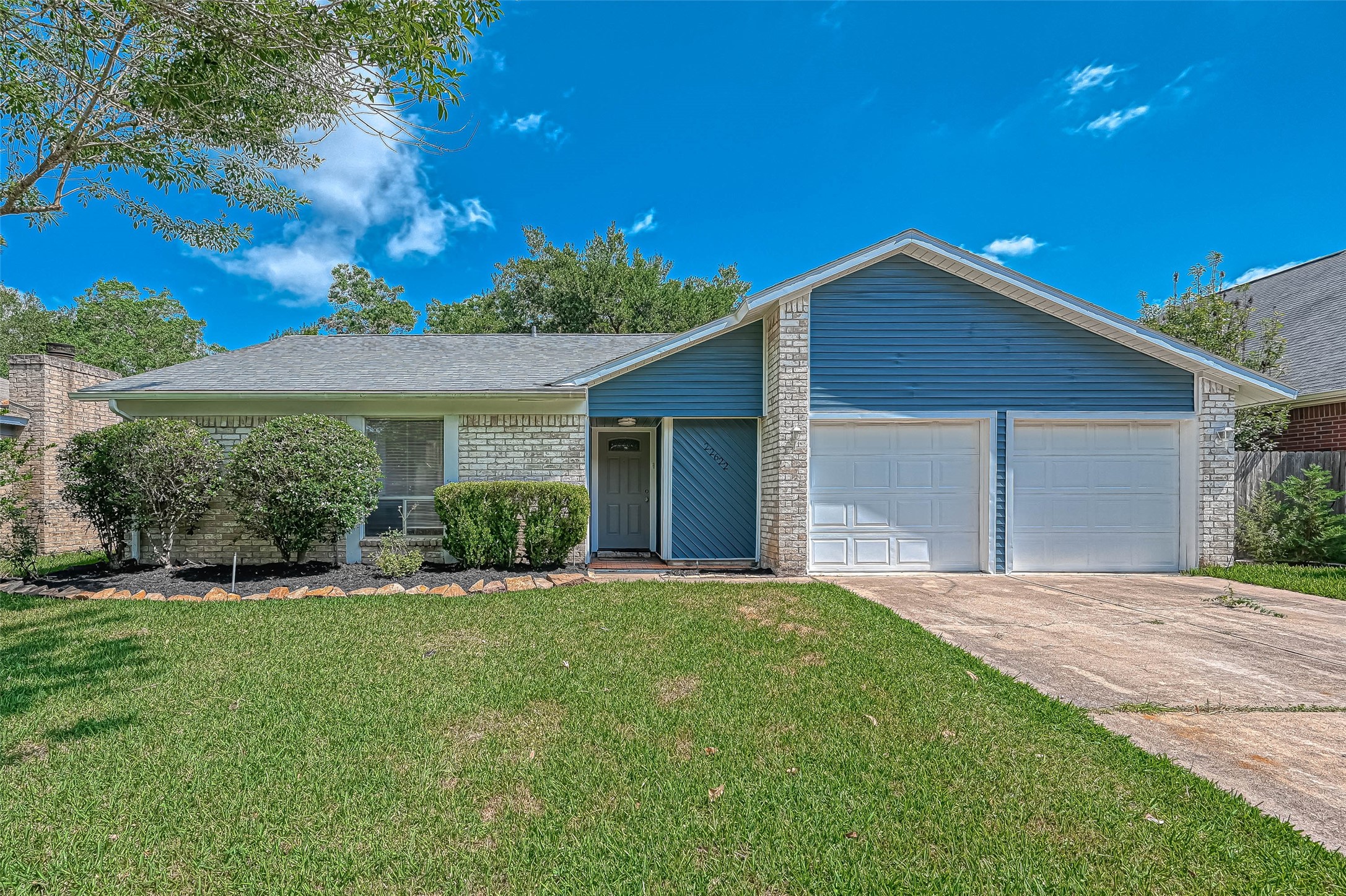 22622 John Rolfe Lane Katy, TX 77449 - Photo 1 of 21 a front view of a house with a yard and garage