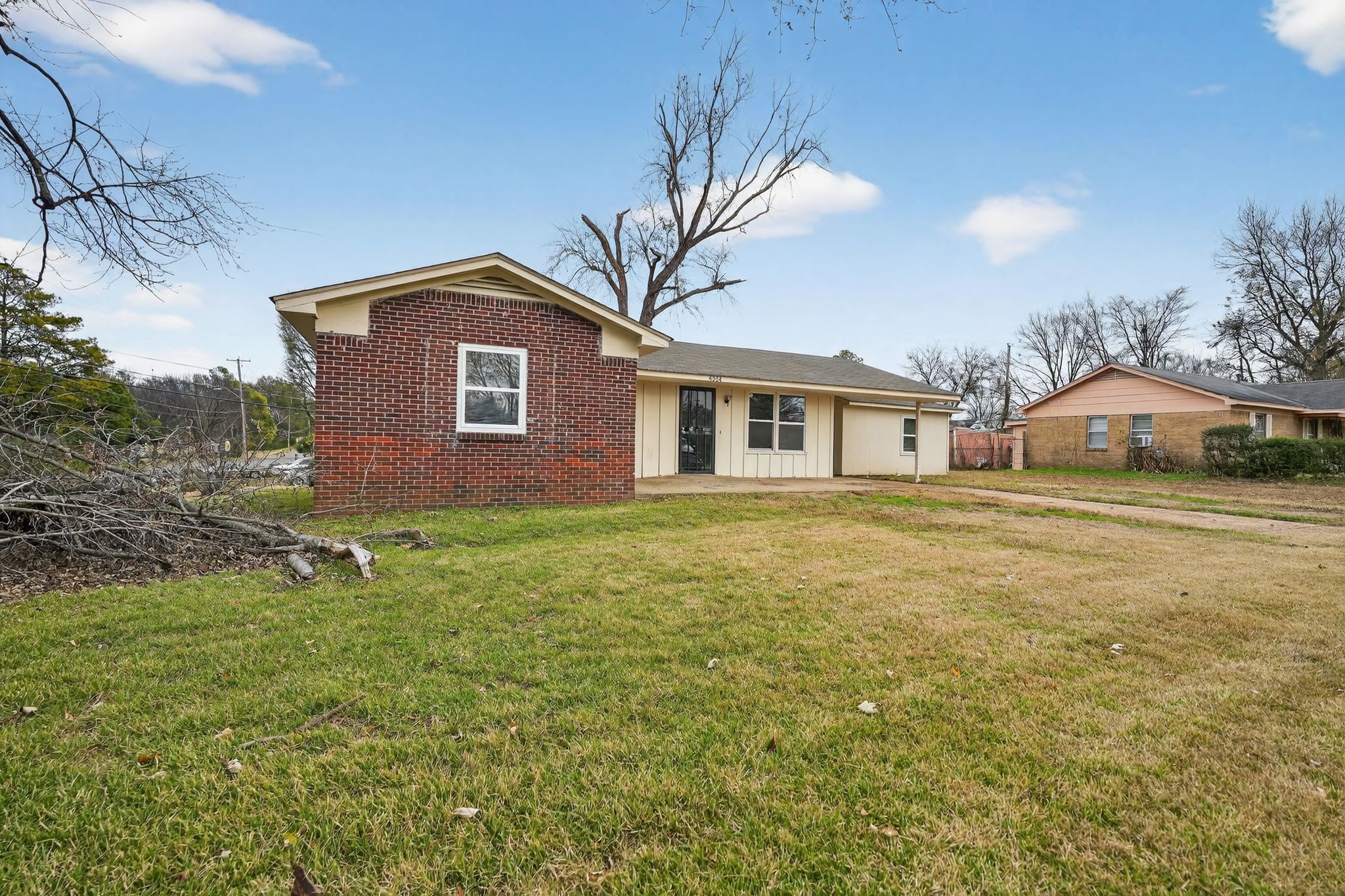 4314 Ford Road Memphis, TN 38109 - Photo 1 of 31 a house view with a garden space