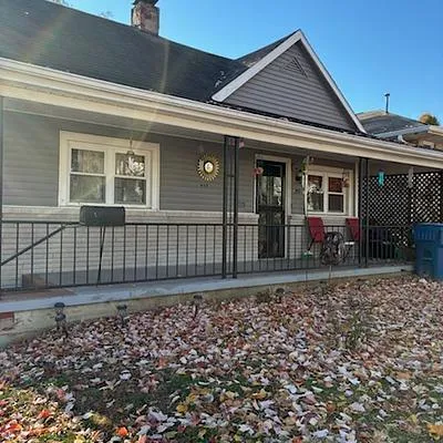 front view of a house with a small yard