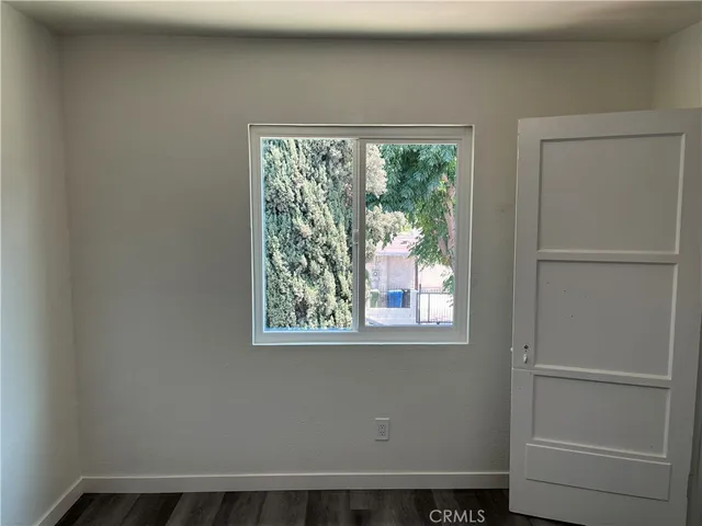 a view of a room that has a window