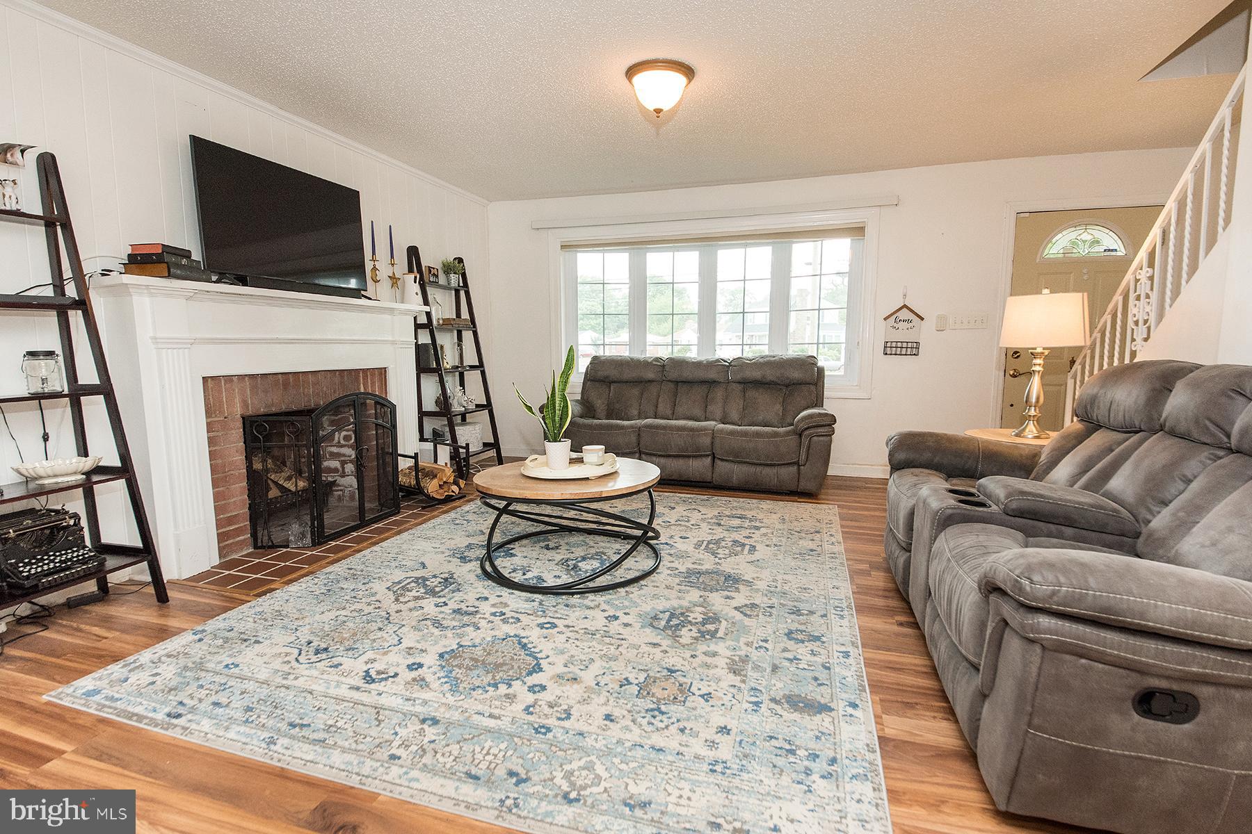 546 Maple Avenue Ewing, NJ 08618 - Photo 4 of 37 Living space with wood burning fireplace