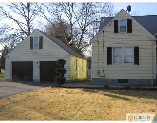 399 Plainfield Road Edison, NJ 08820 - Photo 7 of 8 a view of a house with a yard