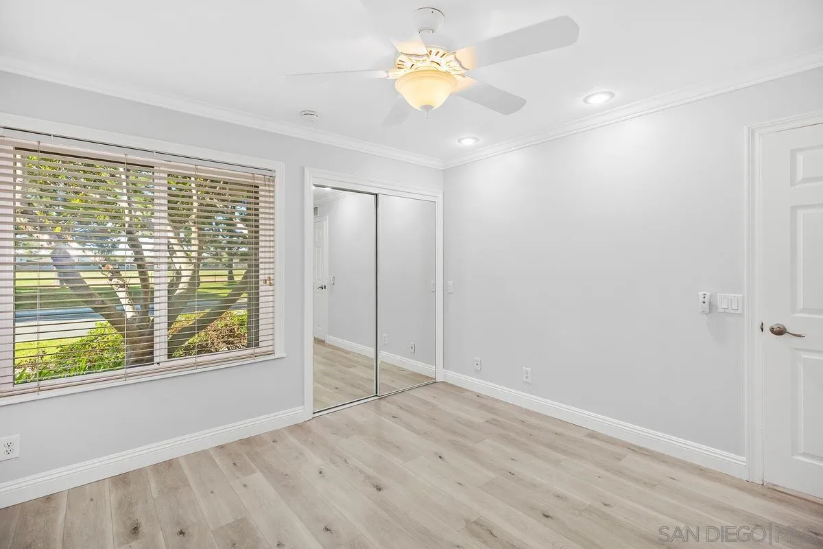 14 Dragonfly, Unit 25 Irvine, CA 92604 - Photo 22 of 32 wooden floor in an empty room with a window
