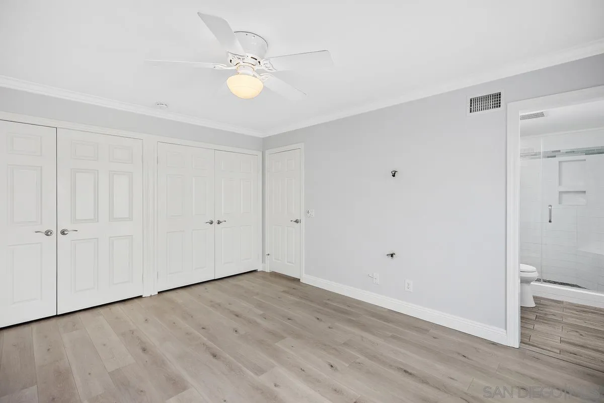 14 Dragonfly, Unit 25 Irvine, CA 92604 - Photo 24 of 32 a view of an empty room with wooden floor