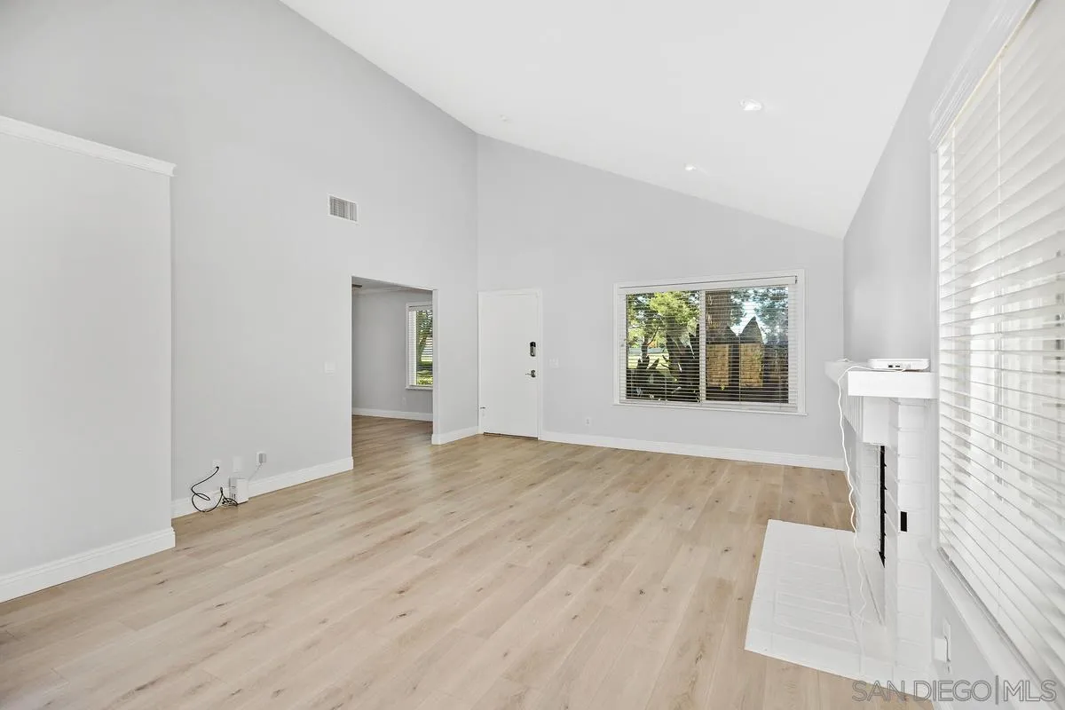 14 Dragonfly, Unit 25 Irvine, CA 92604 - Photo 7 of 29 wooden floor in an empty room with a window
