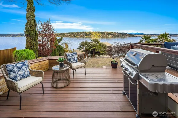 a view of a balcony with furniture