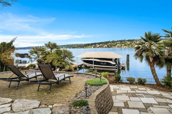 a view of a swimming pool with a patio