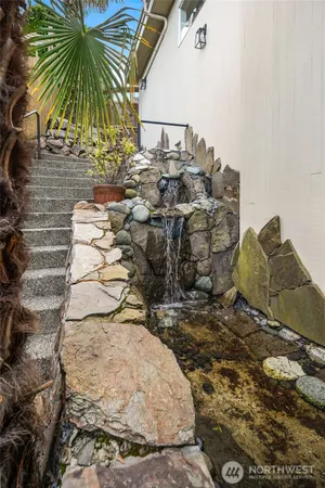 a view of a backyard of the house