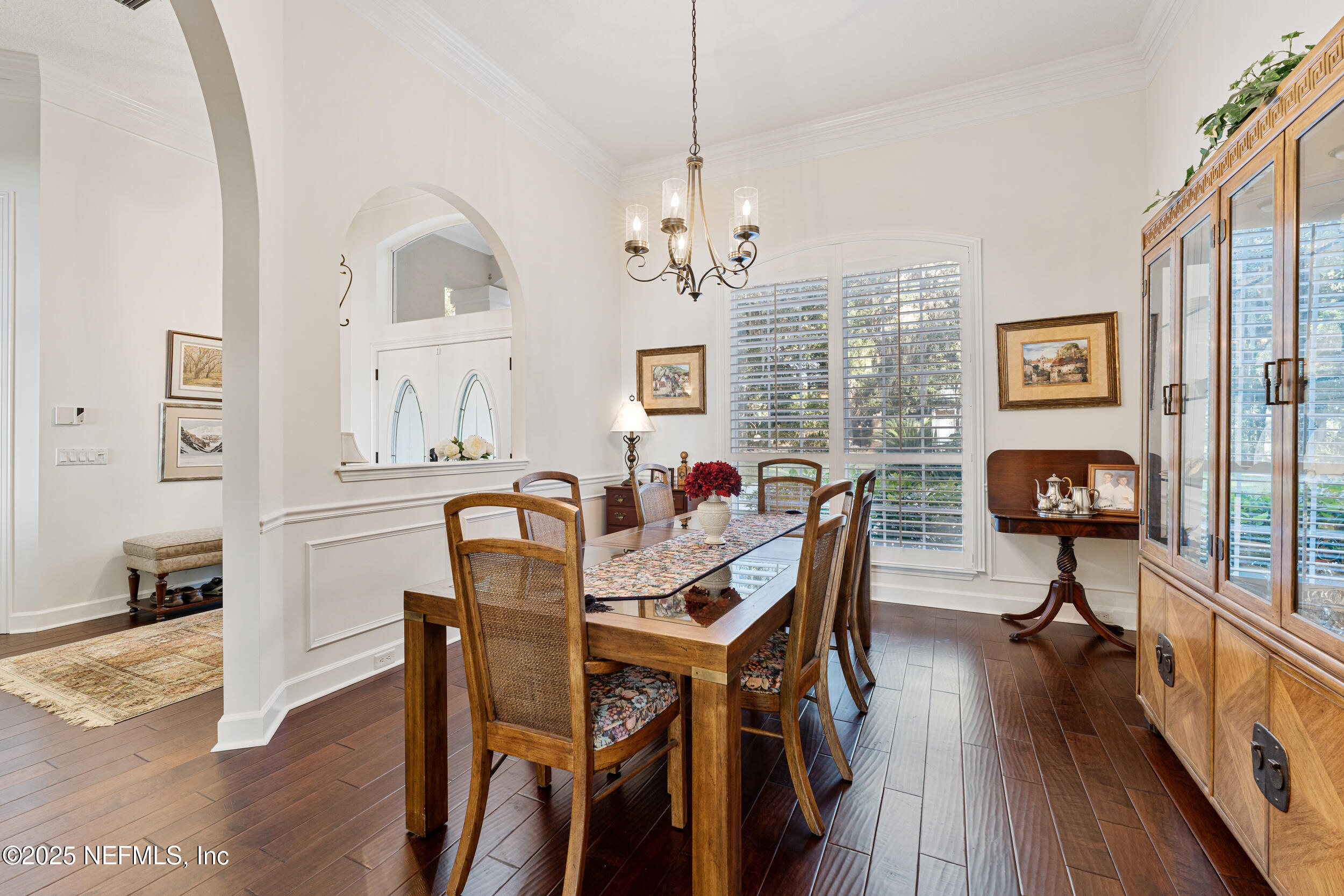 686 Frederic Drive Fleming Island, FL 32003 - Photo 21 of 57 a view of a dining room with furniture window and wooden floor