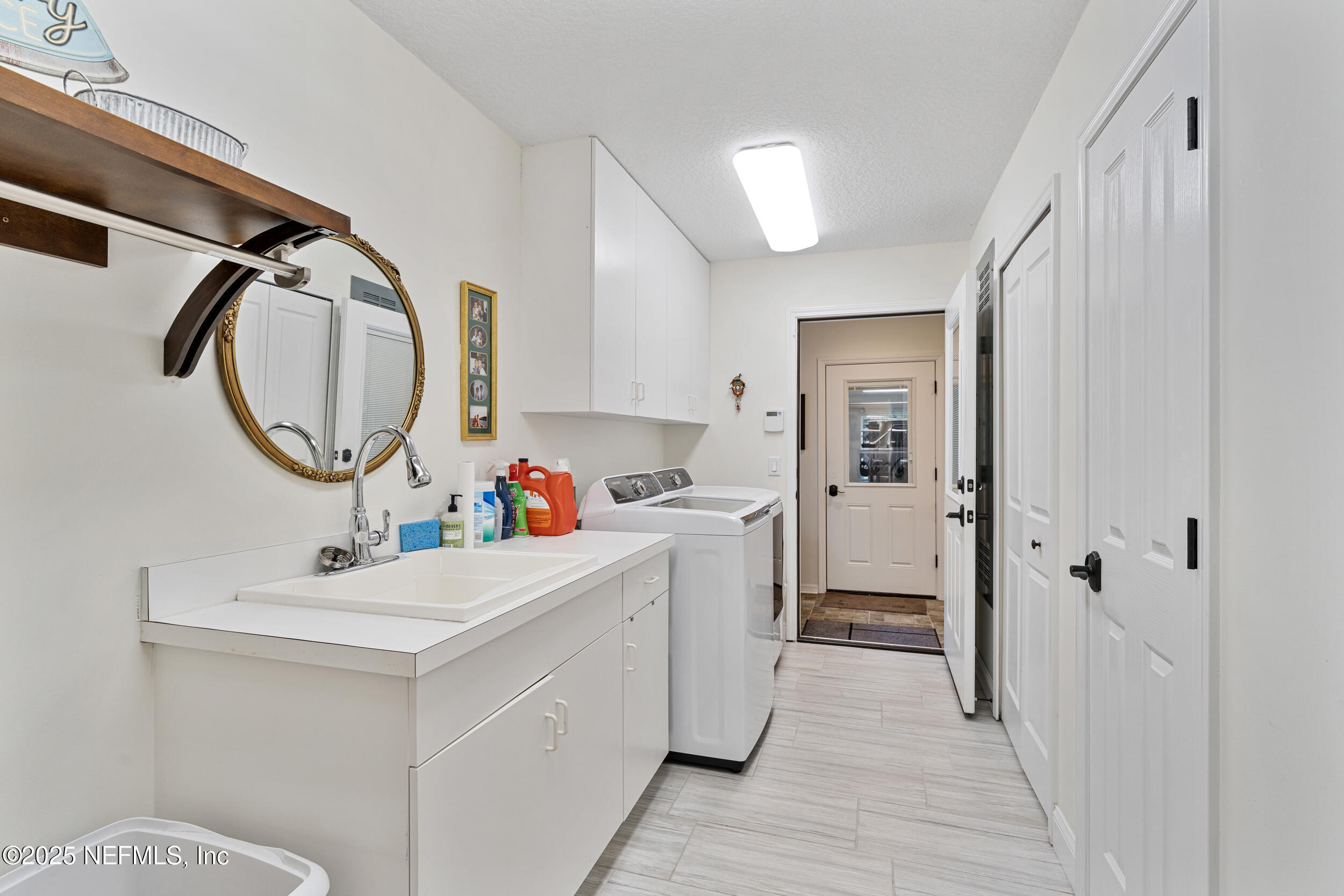 686 Frederic Drive Fleming Island, FL 32003 - Photo 33 of 57 a bathroom with a sink mirror vanity and toilet