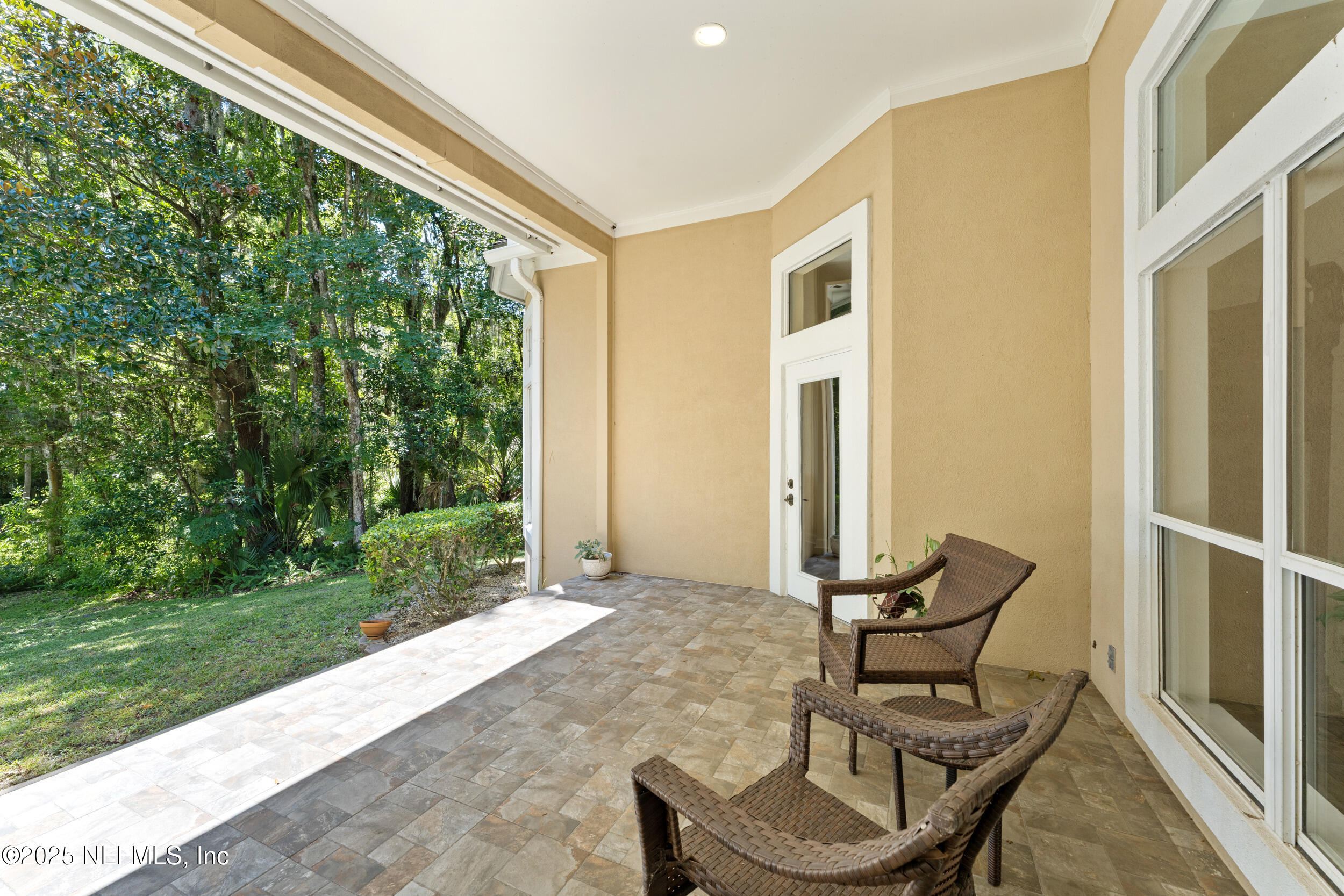 686 Frederic Drive Fleming Island, FL 32003 - Photo 37 of 57 a view of backyard with outdoor seating and plants