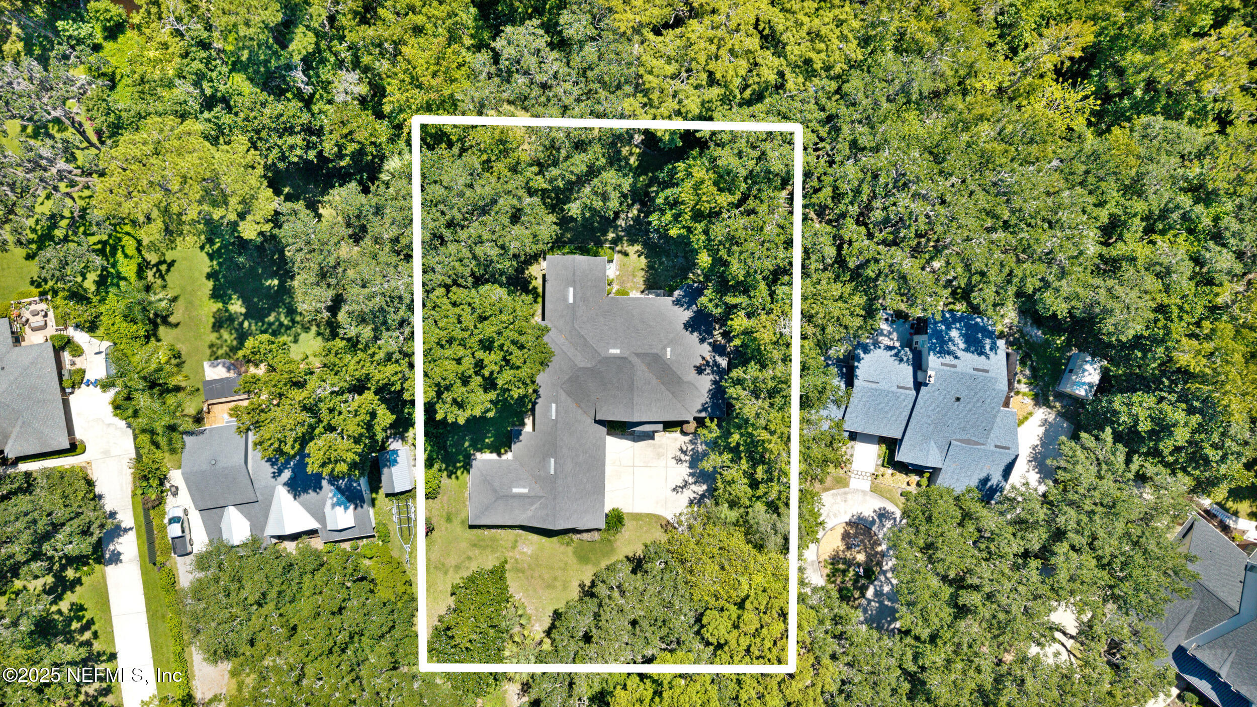 686 Frederic Drive Fleming Island, FL 32003 - Photo 55 of 57 an aerial view of a house with yard and outdoor seating