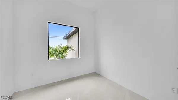 a view of an empty room with window
