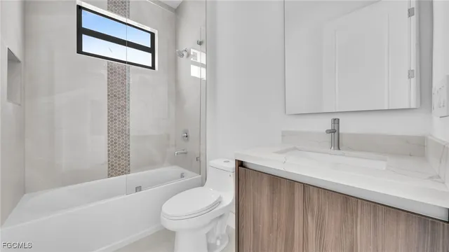 a view of a house with a big yard plants and large trees