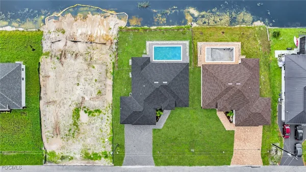 an aerial view of a house with a garden