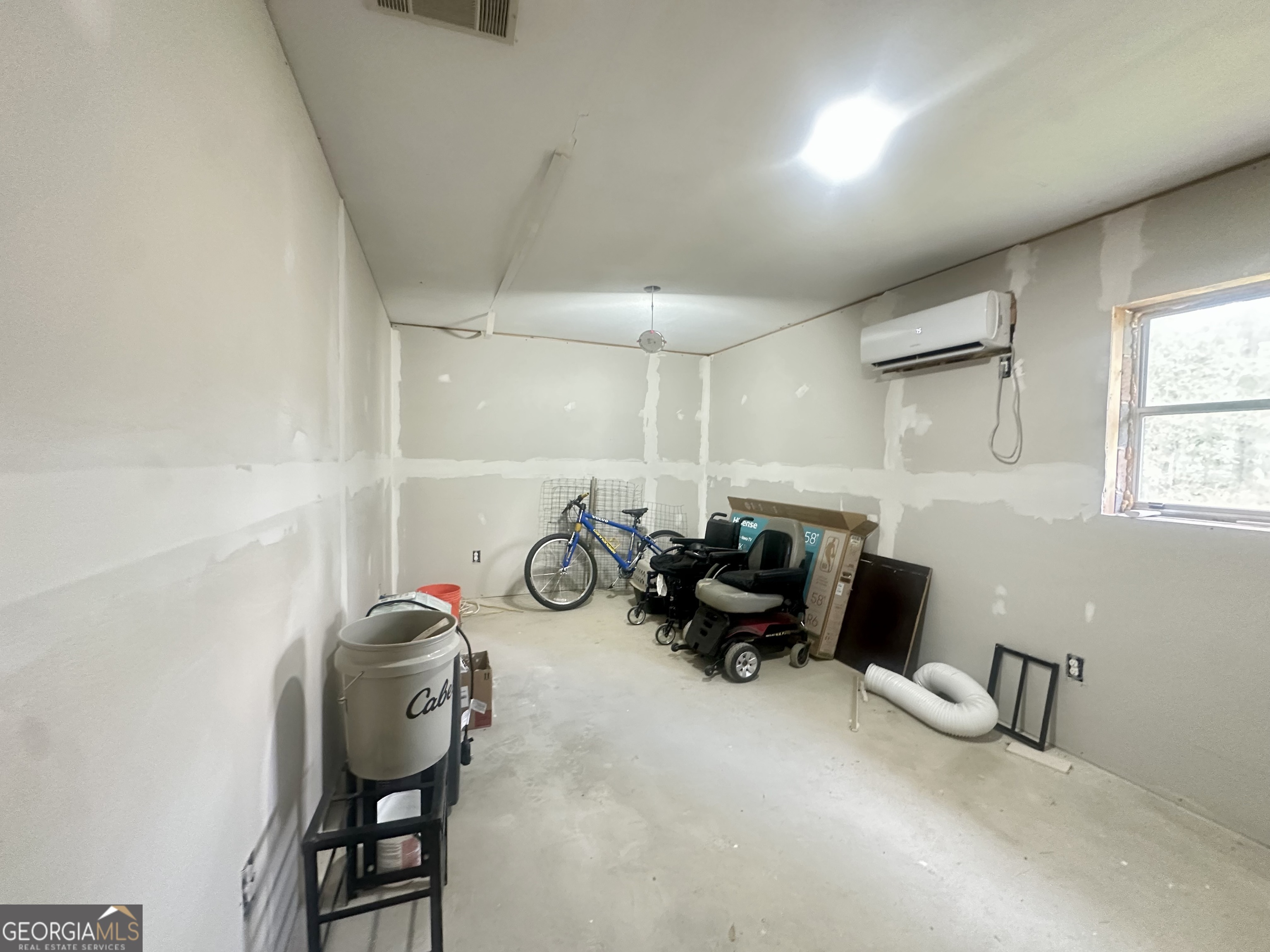 251 Bill Hambrick Road Eastman, GA 31023 - Photo 12 of 32 a view of a room with gym equipment