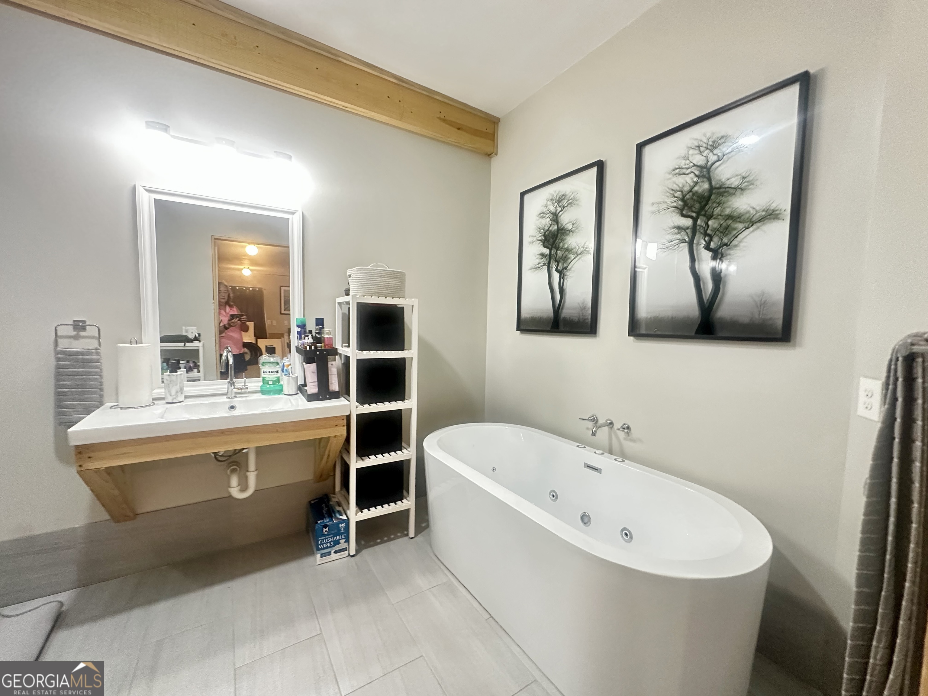 251 Bill Hambrick Road Eastman, GA 31023 - Photo 15 of 32 a bathroom with a bathtub and sink