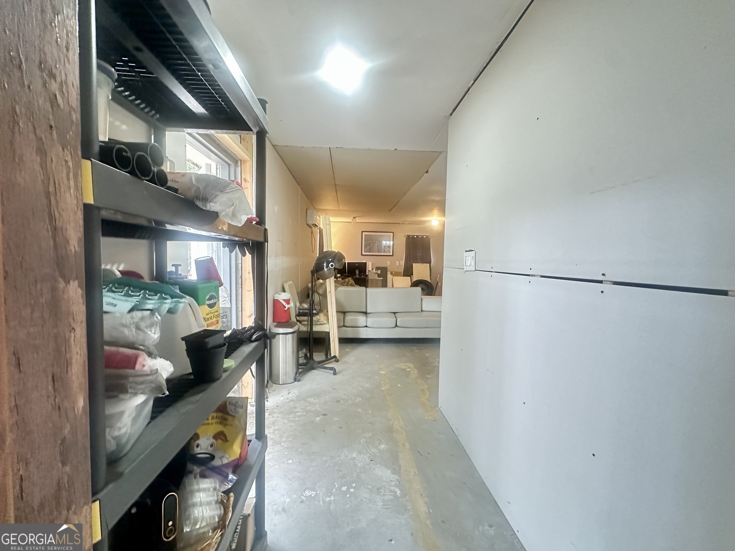 251 Bill Hambrick Road Eastman, GA 31023 - Photo 18 of 32 a living room with furniture and a large window