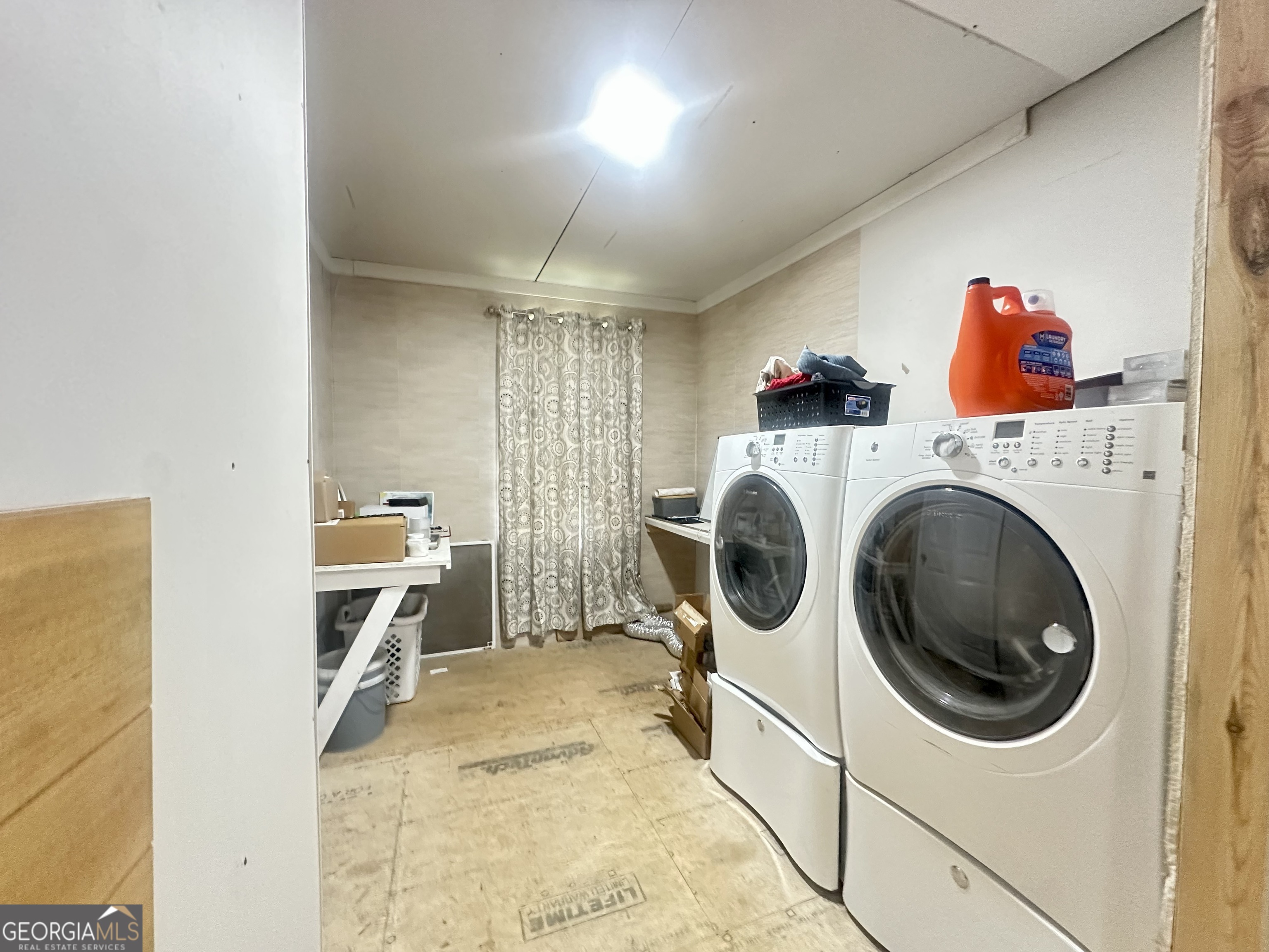 251 Bill Hambrick Road Eastman, GA 31023 - Photo 21 of 32 a utility room with dryer and washer