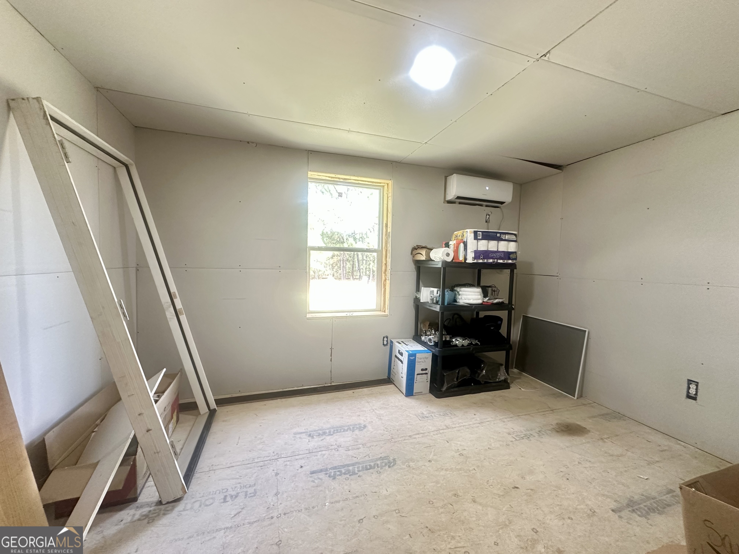 251 Bill Hambrick Road Eastman, GA 31023 - Photo 23 of 32 a room with window and furniture