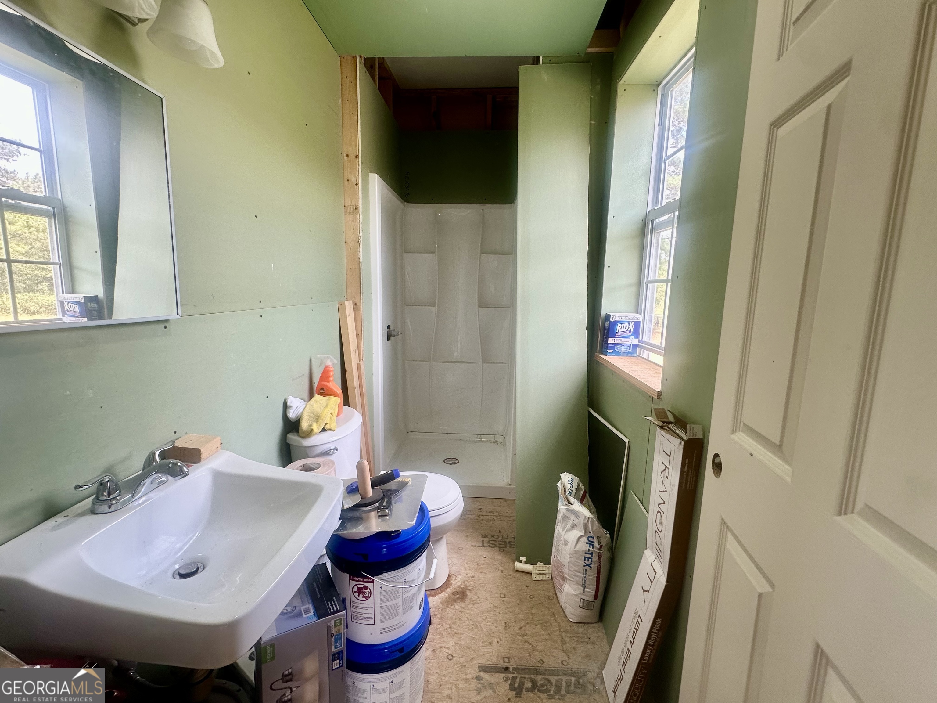 251 Bill Hambrick Road Eastman, GA 31023 - Photo 32 of 32 a bathroom with a sink and toilet