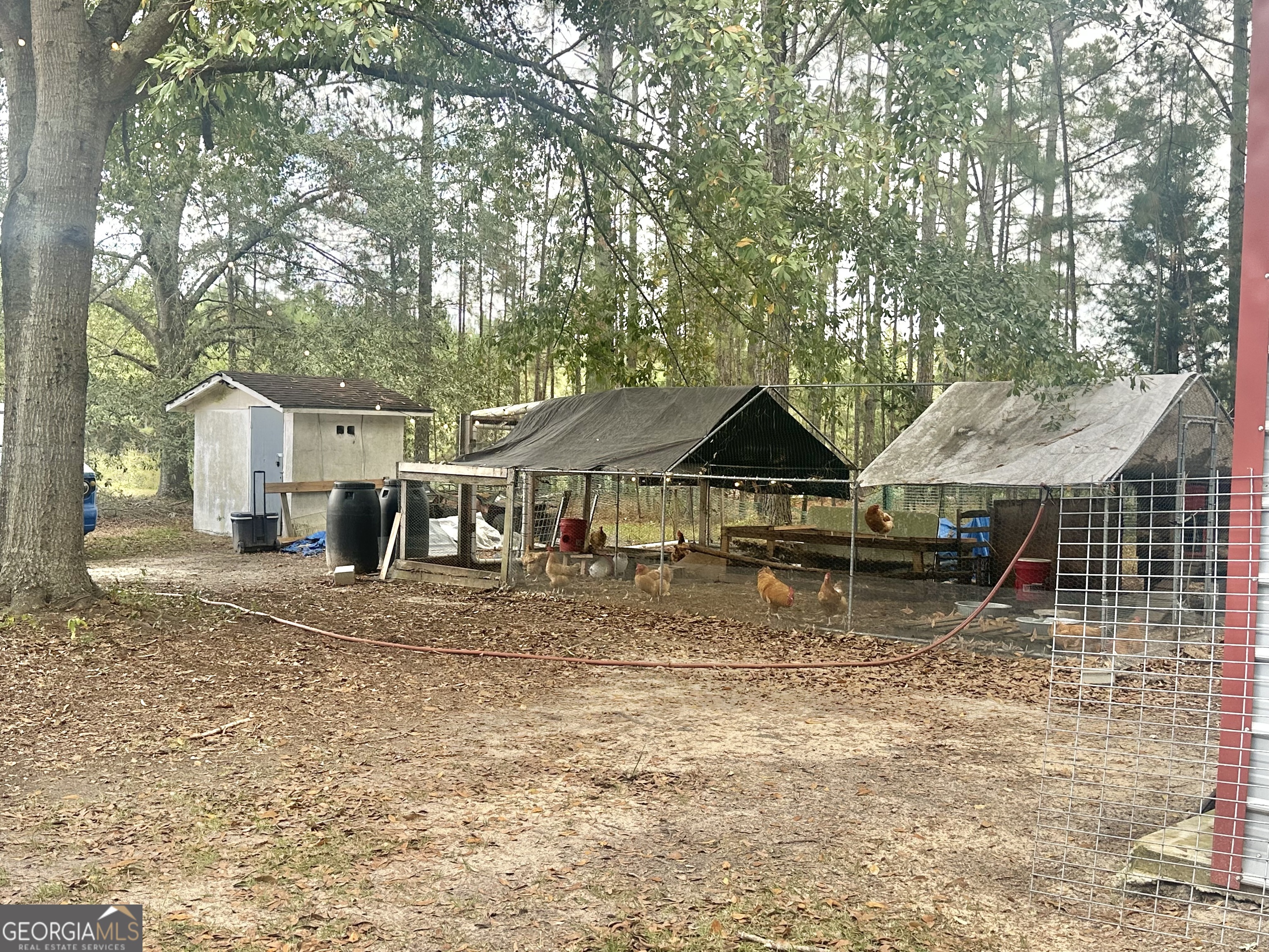 251 Bill Hambrick Road Eastman, GA 31023 - Photo 8 of 32 a view of house with wooden fence