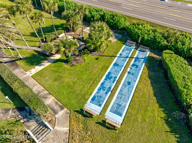 a view of swimming pool with a yard