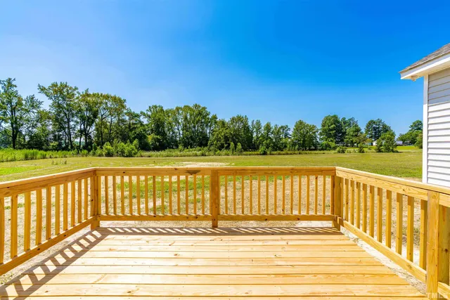 a view of wooden balcony with outdoor space