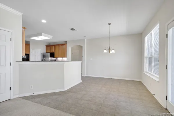 a view of a kitchen with a sink