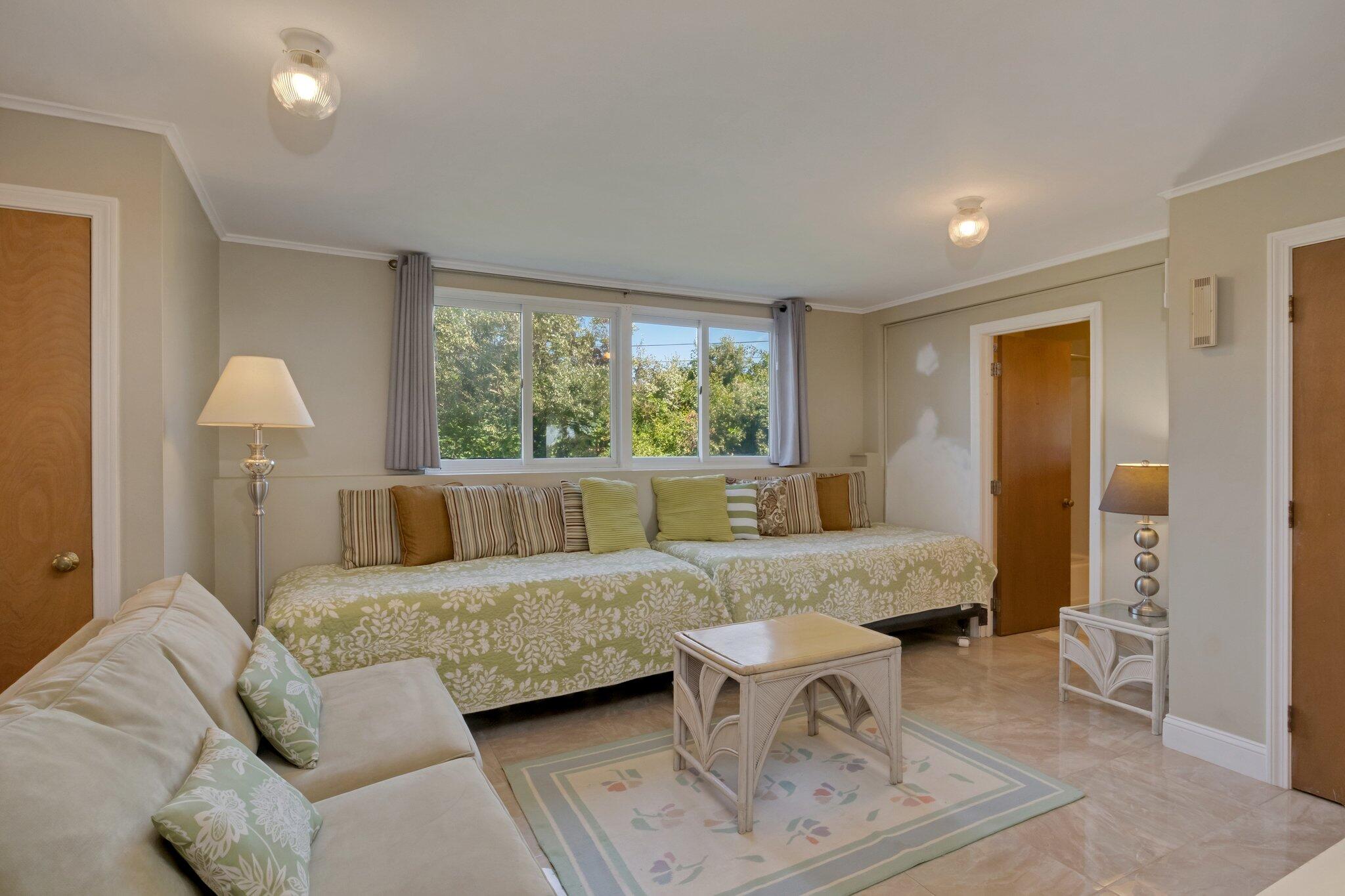 12 Twine Field Road Truro, MA 02666 - Photo 18 of 25 a living room with furniture and a large window