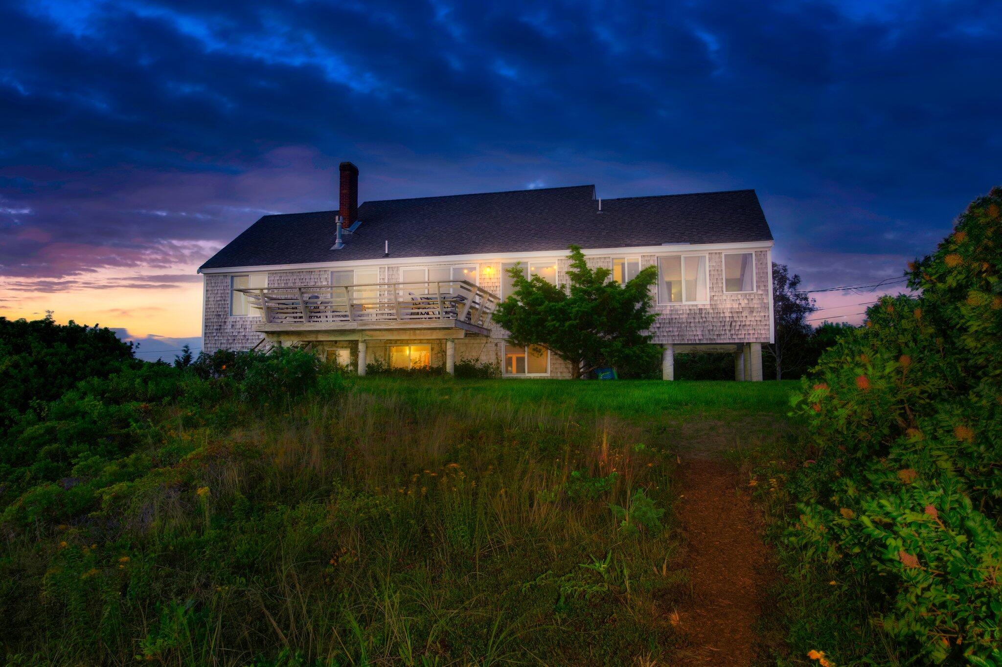 12 Twine Field Road Truro, MA 02666 - Photo 21 of 25 a view of a house with a yard