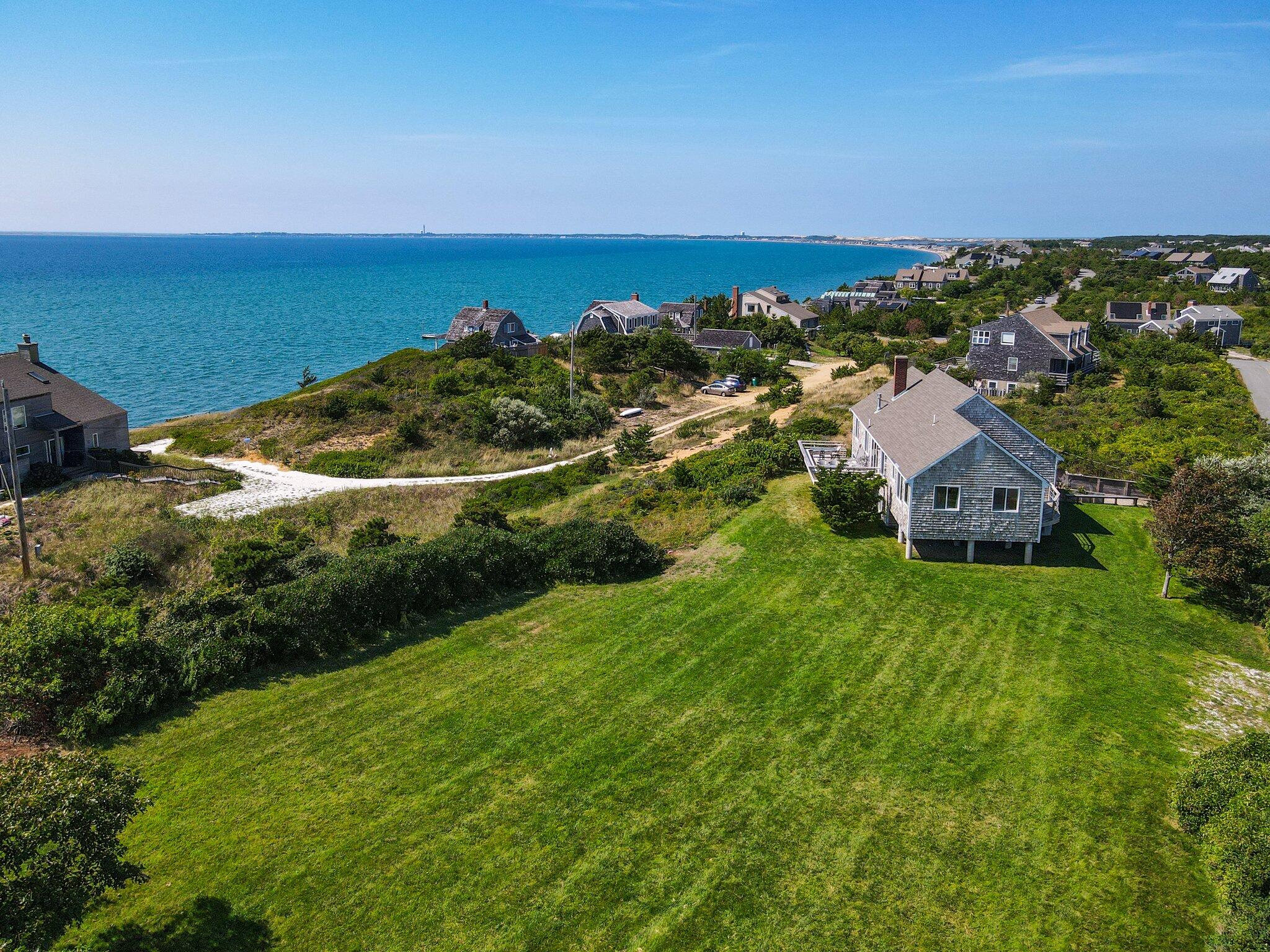12 Twine Field Road Truro, MA 02666 - Photo 4 of 25 an aerial view of residential houses with outdoor space and trees