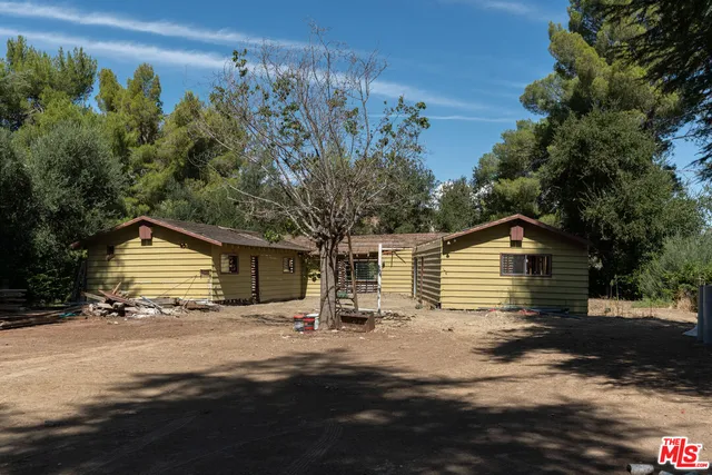 a view of a house with a patio