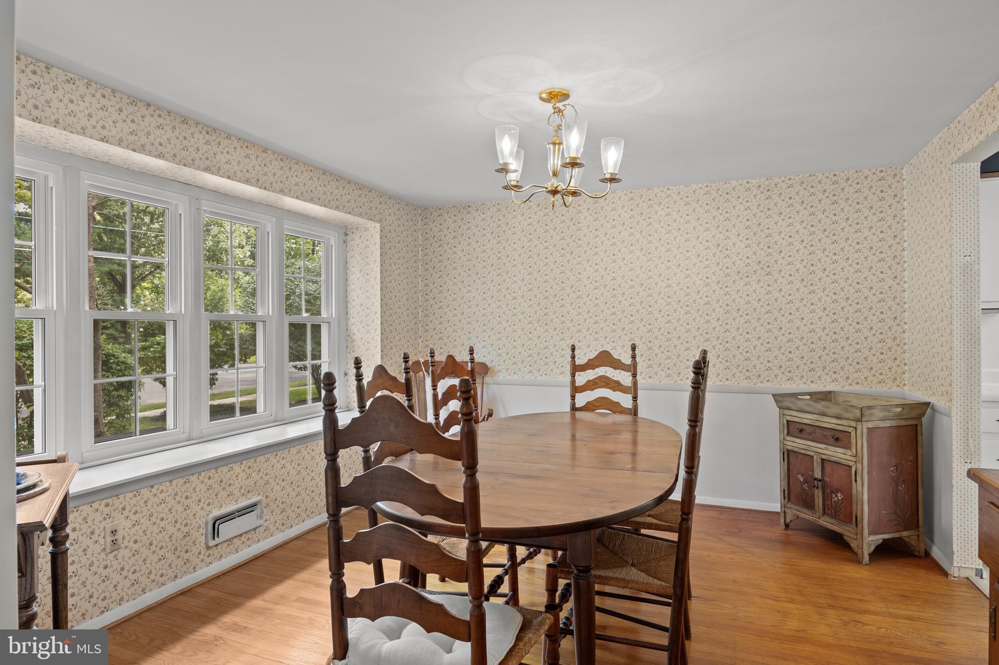 195 Pearl Croft Road Cherry Hill, NJ 08034 - Photo 15 of 38 a view of a dining room with furniture window and wooden floor