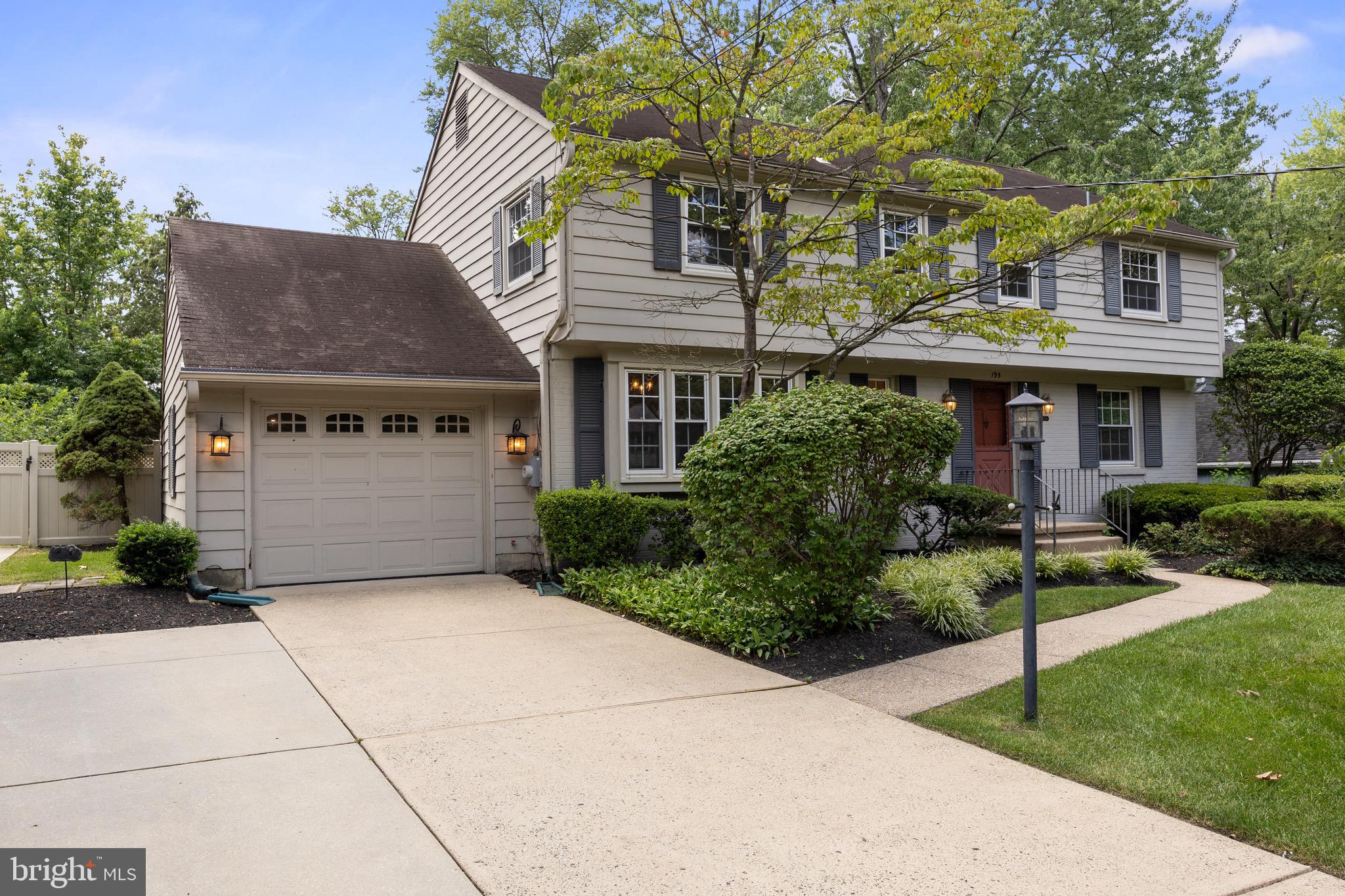 195 Pearl Croft Road Cherry Hill, NJ 08034 - Photo 2 of 38 a front view of a house with a yard and garage