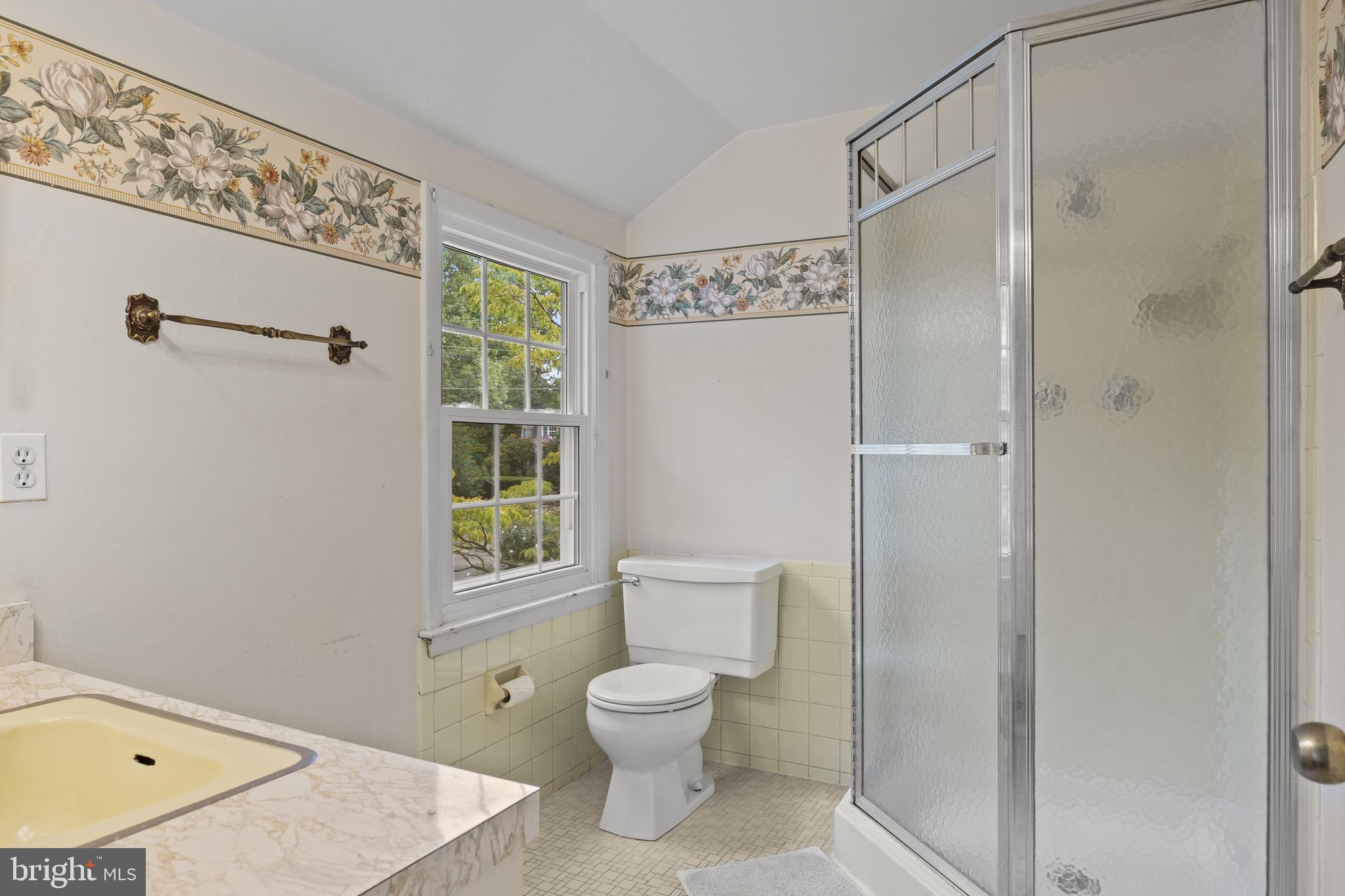 195 Pearl Croft Road Cherry Hill, NJ 08034 - Photo 24 of 38 a bathroom with a granite countertop toilet a sink and a shower