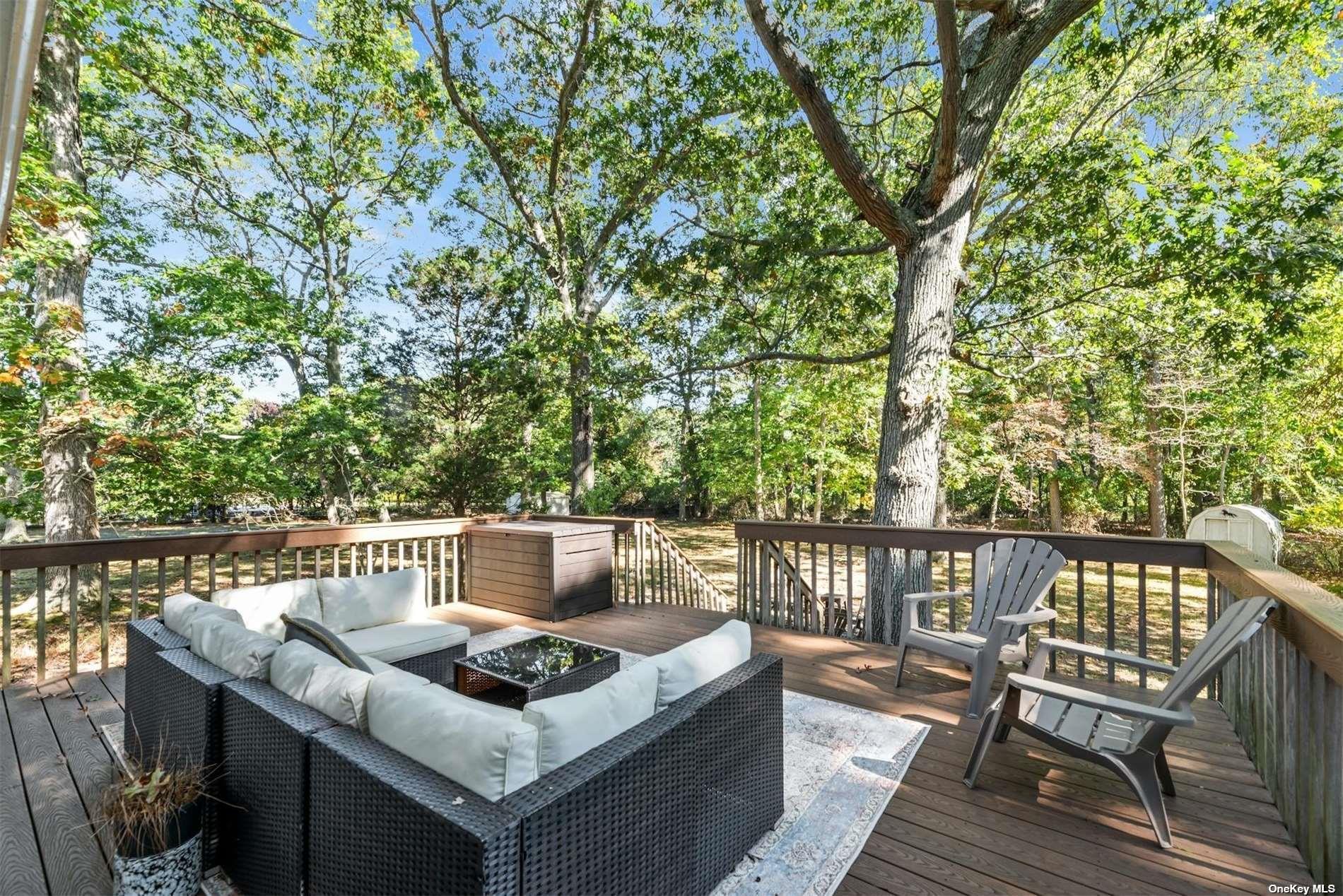 3670 Rocky Point Road East Marion, NY 11939 - Photo 18 of 26 a view of a patio with two chairs