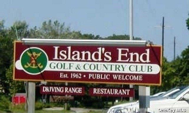 3670 Rocky Point Road East Marion, NY 11939 - Photo 24 of 26 a sign that is on the wooden wall