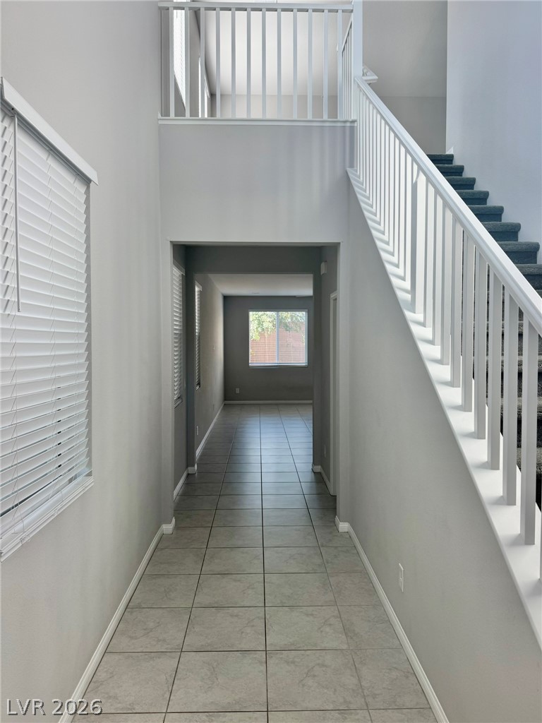 9953 Tucket Point Court Las Vegas, NV 89178 - Photo 2 of 22 A grand entrance with high ceilings welcomes you into this inviting home.