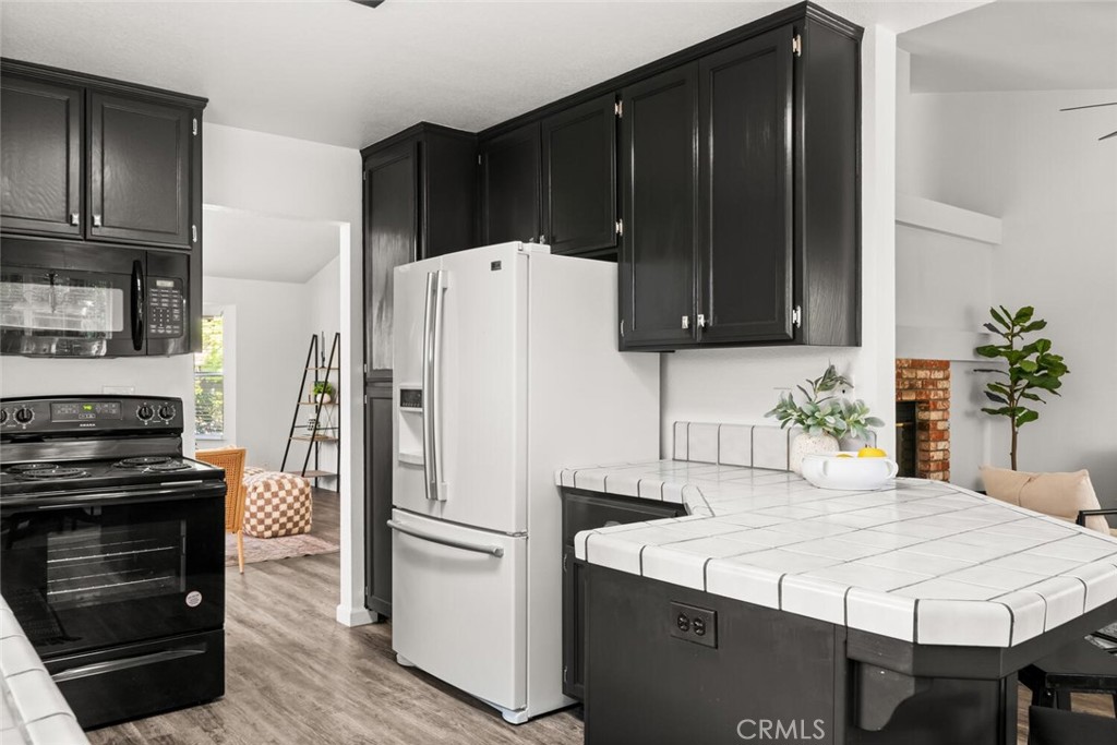 259 Picholine Way Chico, CA 95928 - Photo 23 of 38 a kitchen with appliances a counter space and cabinets