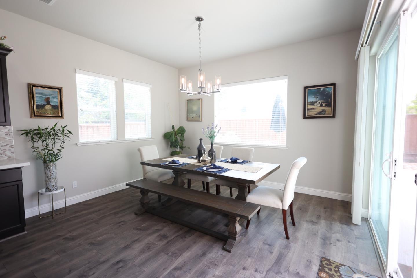 478 Logan Way Marina, CA 93933 - Photo 11 of 42 a view of a dining room with furniture window and wooden floor