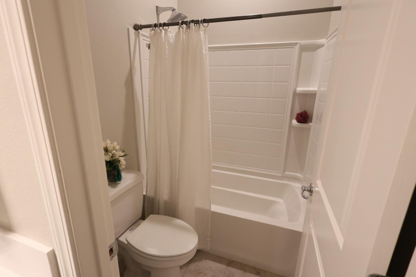 478 Logan Way Marina, CA 93933 - Photo 40 of 42 a white toilet sitting next to a shower