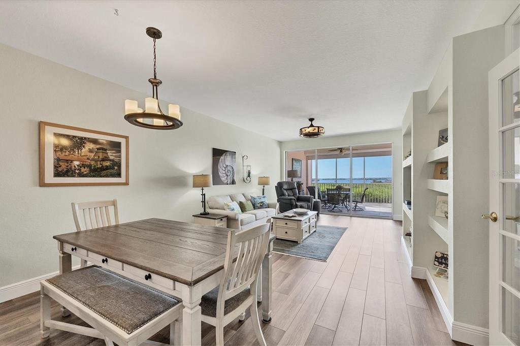 13313 Gasparilla Road, Unit 202 Placida, FL 33946 - Photo 23 of 57 a living room with furniture and a table