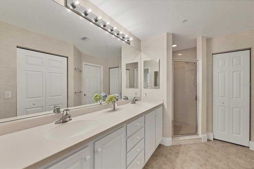 13313 Gasparilla Road, Unit 202 Placida, FL 33946 - Photo 27 of 57 a bathroom with a sink and a mirror