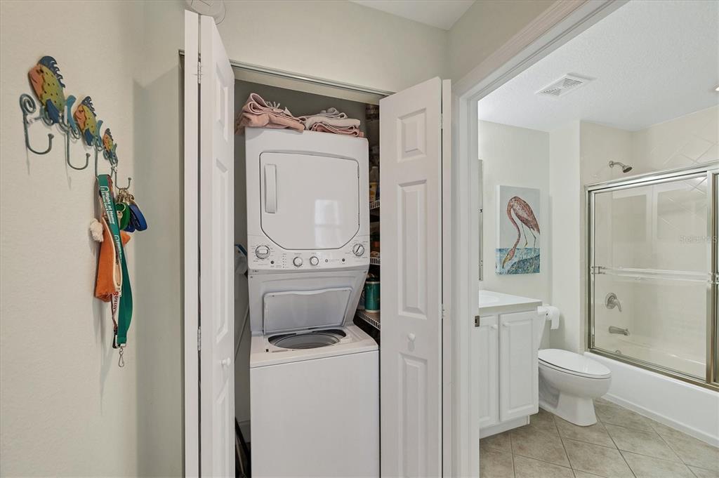 13313 Gasparilla Road, Unit 202 Placida, FL 33946 - Photo 31 of 57 a bathroom with a toilet and a shower