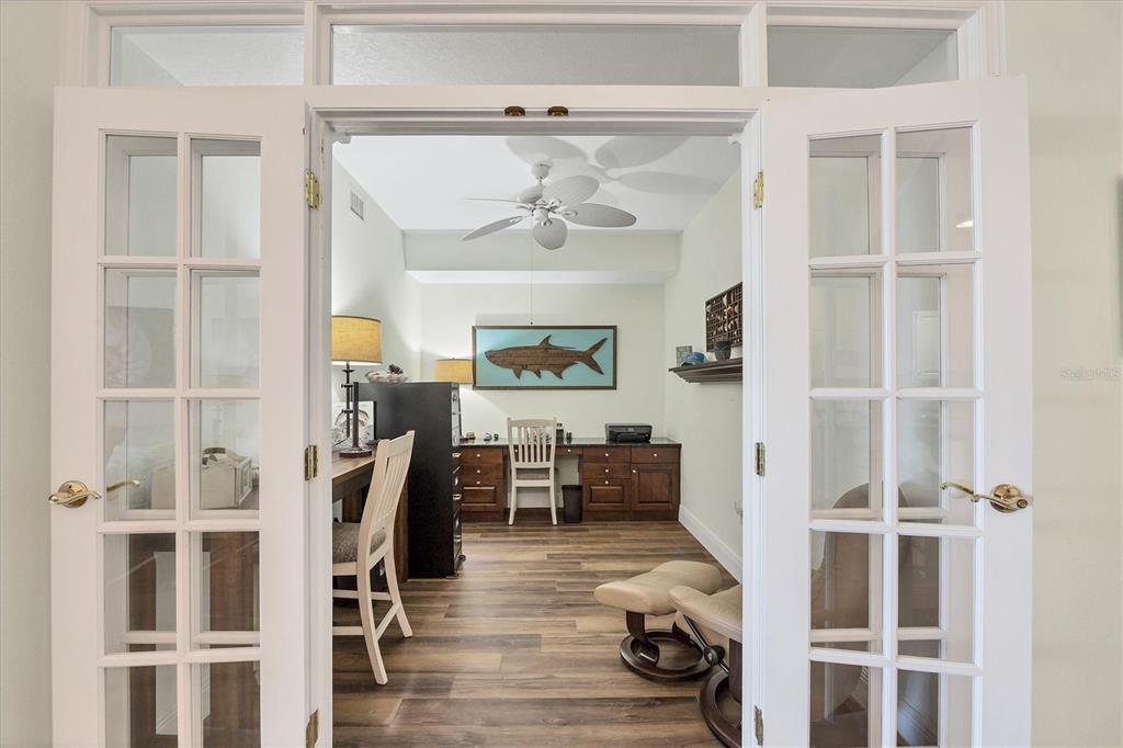13313 Gasparilla Road, Unit 202 Placida, FL 33946 - Photo 33 of 57 a view of a livingroom with furniture and wooden floor