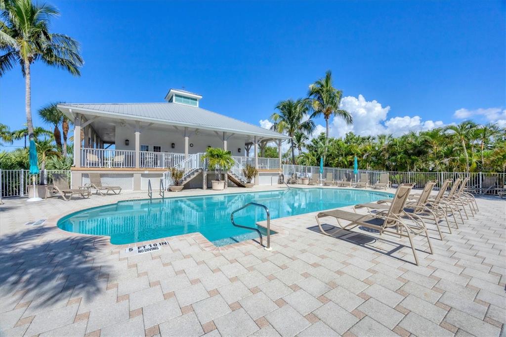 13313 Gasparilla Road, Unit 202 Placida, FL 33946 - Photo 46 of 57 a view of a backyard